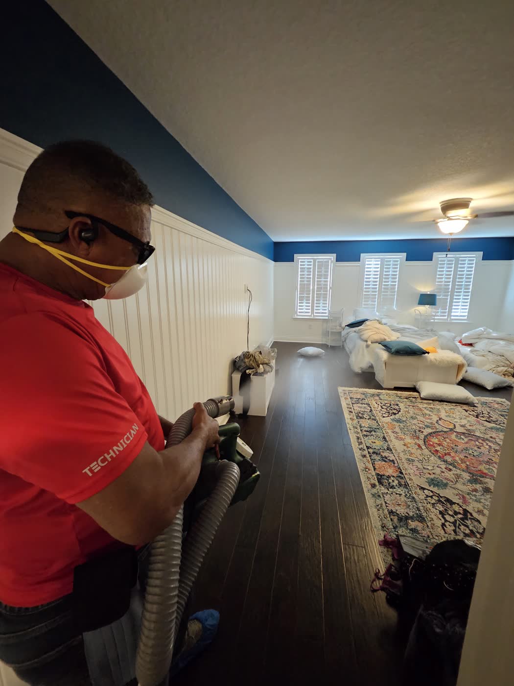 Technician working with HEPA equipment